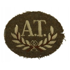 British Army Anti-Tank Gun Layer (A.T.) Cloth Proficiency Arm Badge