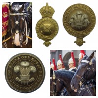 Military horse furniture, bridle badges and bit bosses. 